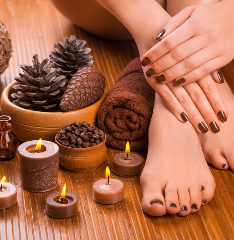 Beautiful,Brown,Manicure,And,Pedicure,On,The,Bamboo